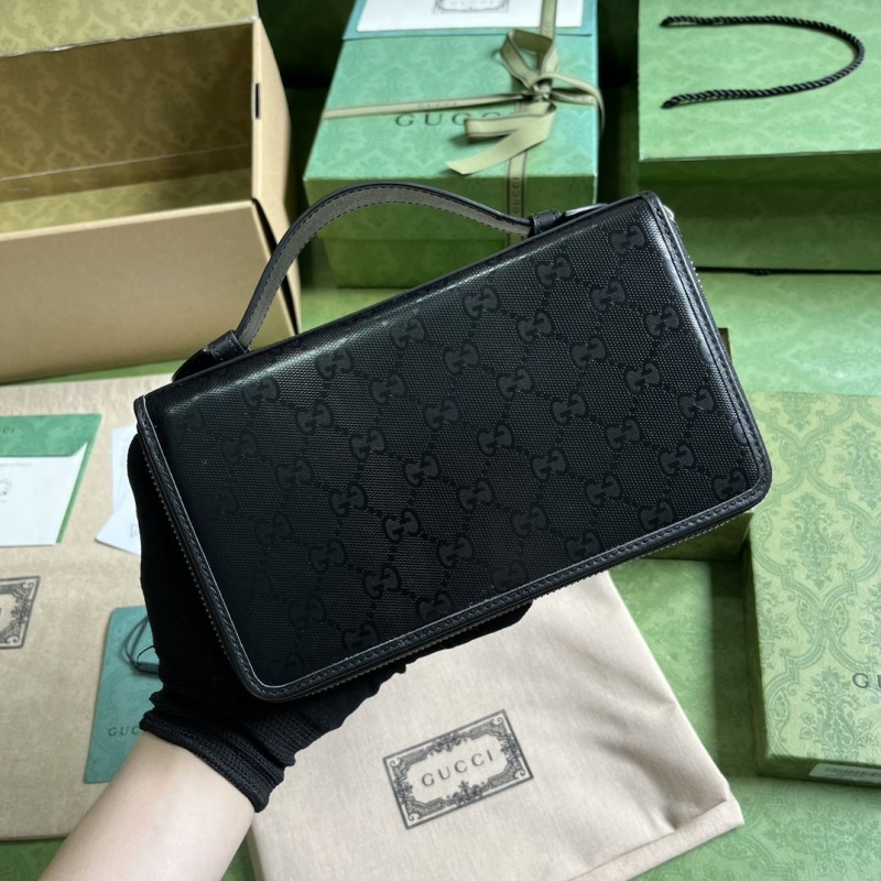 G*u*i clutch bags